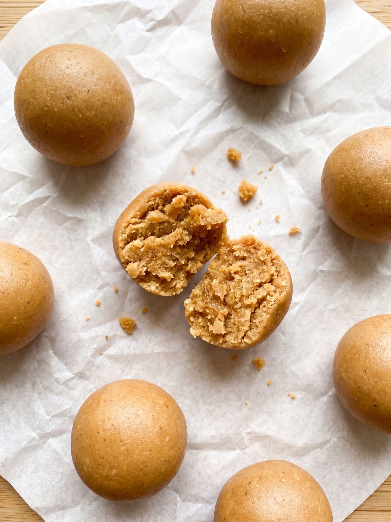 3 ingredient no bake peanut butter balls cut open showing soft chewy center easy homemade peanut butter treat