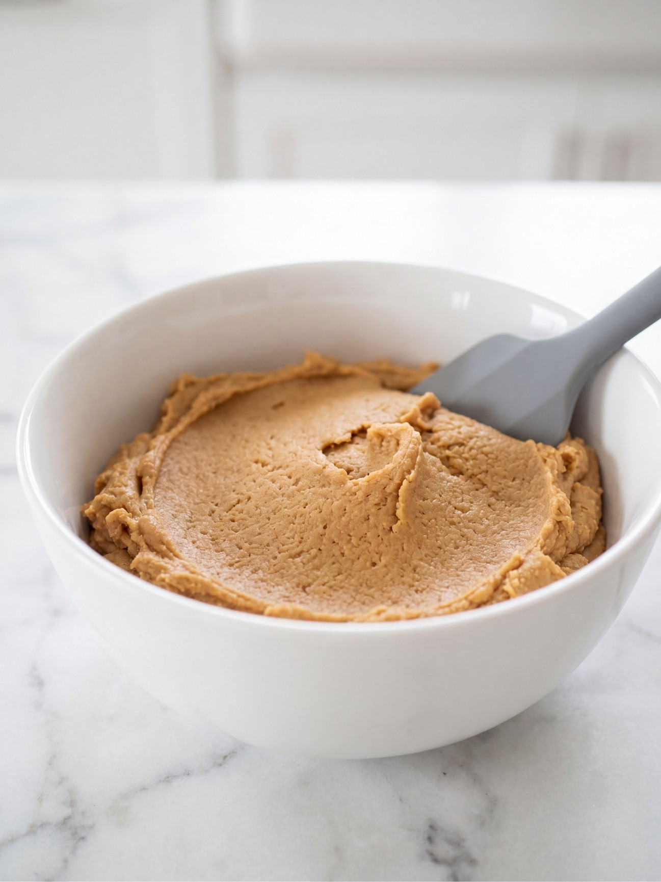 thick peanut butter dough for 3 ingredient no bake peanut butter balls ready to roll easy dessert